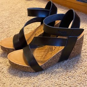 Black wedge sandals